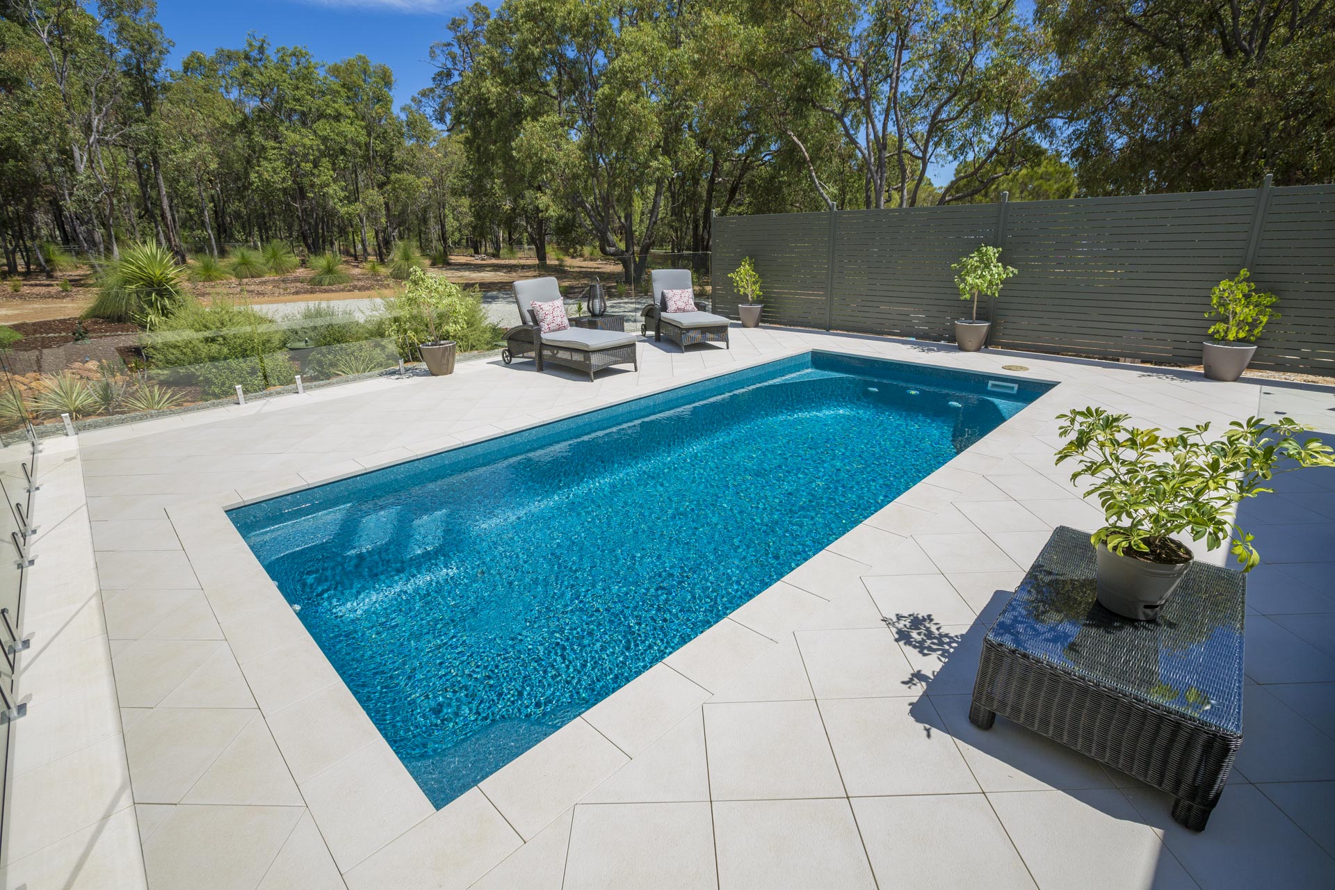 Imagine relaxing by a pool like this on a warm summers day